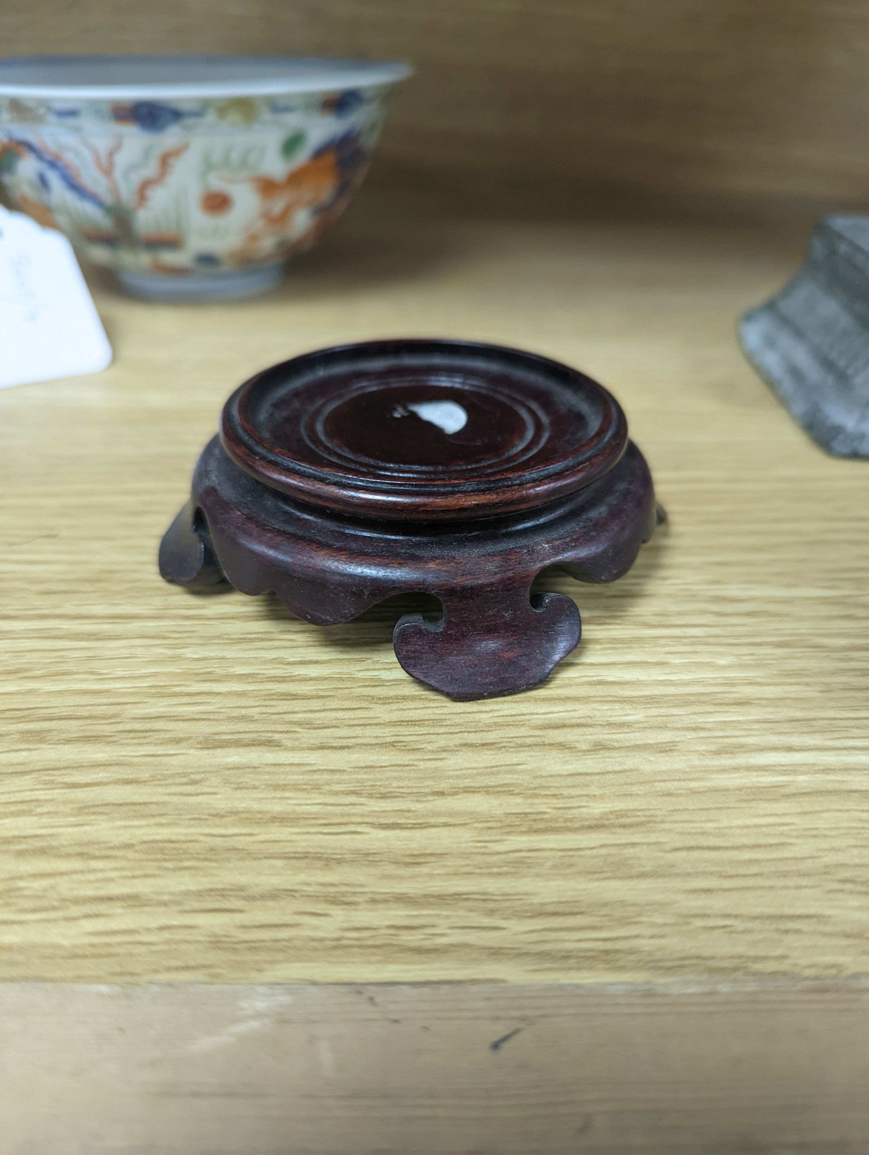 A Wucai bowl, dragon and flamingo pearl decoration, Jiaqing mark, on wood stand. 16cm diameter